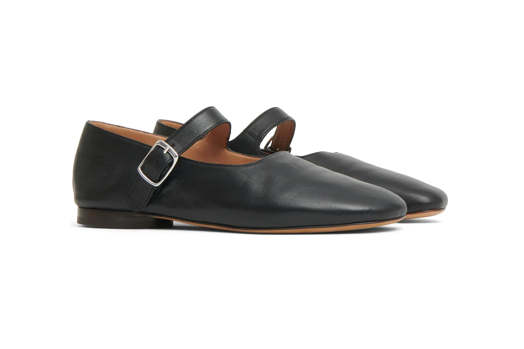 A pair of black leather Mary Jane style shoes with silver buckles.