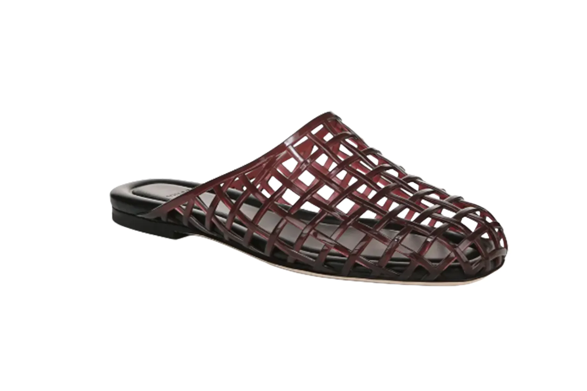 A single dark red caged jelly flat shoe.