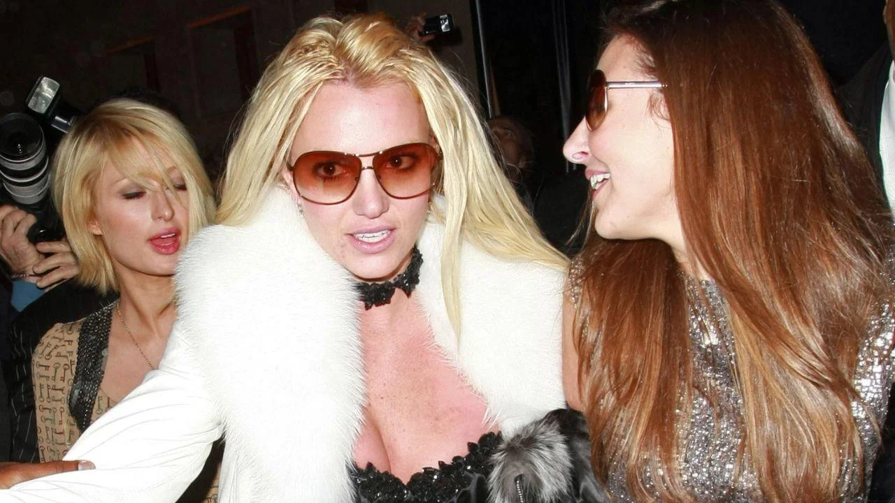 Photo of Paris Hilton explained that she and Britney Spears bonded over the 'shared trauma' they experienced as a women in the early 2000s.