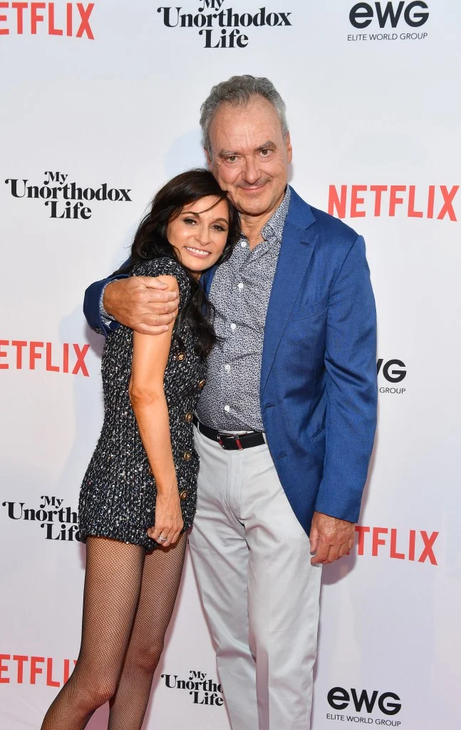 Julia Haart and Silvio Scaglia embracing at the premiere of Netflix's "My Unorthodox Life".