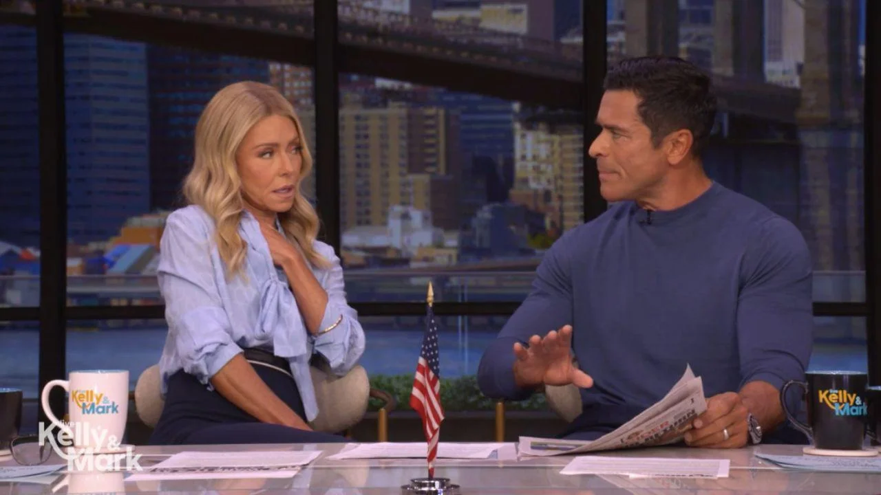 Image of Mark Consuelos and a 'Live' crew member discussed how 'hard' the marathon is. 